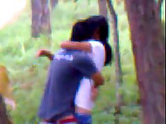 Indian couple is doing it in a local forest, although someone might be watching them in action